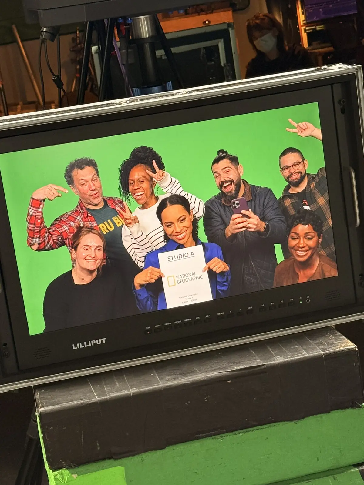Crew group photo on a production monitor at the National Geographic Studio A shoot